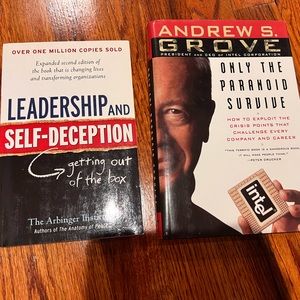 2 lightly used books 1 hardcover 1 paperback - business and success